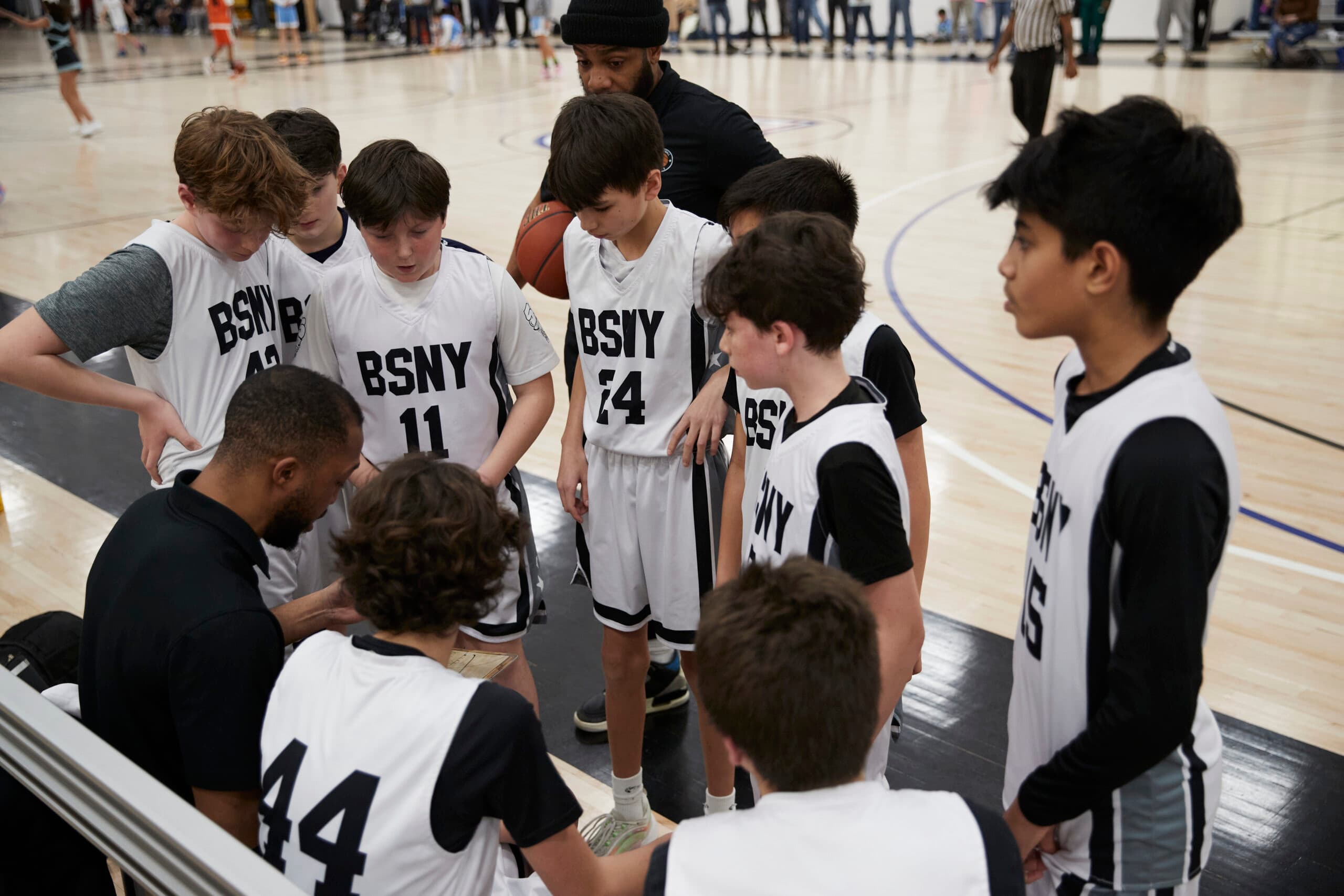 BSNY player driving to the basket